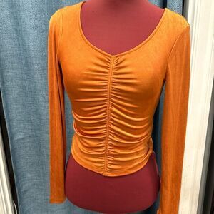 Anthropologie metallic orange long sleeve top